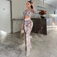 Load image into Gallery viewer, Round neck long sleeve top and high waist lift hips leggings set.
